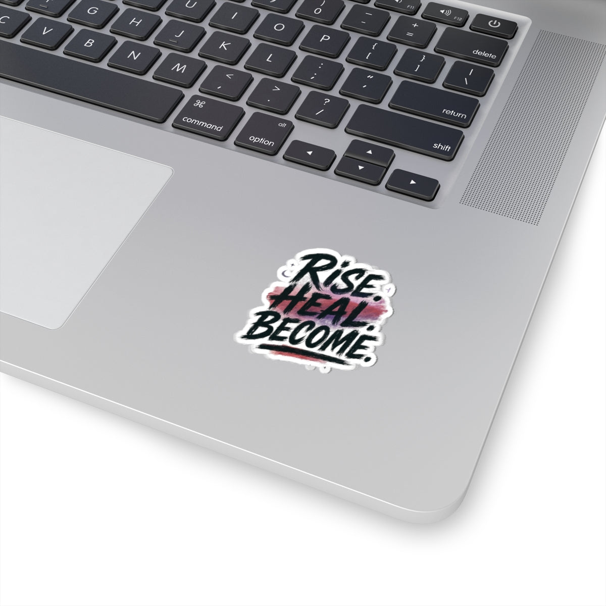 Laptop laying open half showing with a sticker saying I survuved me white background