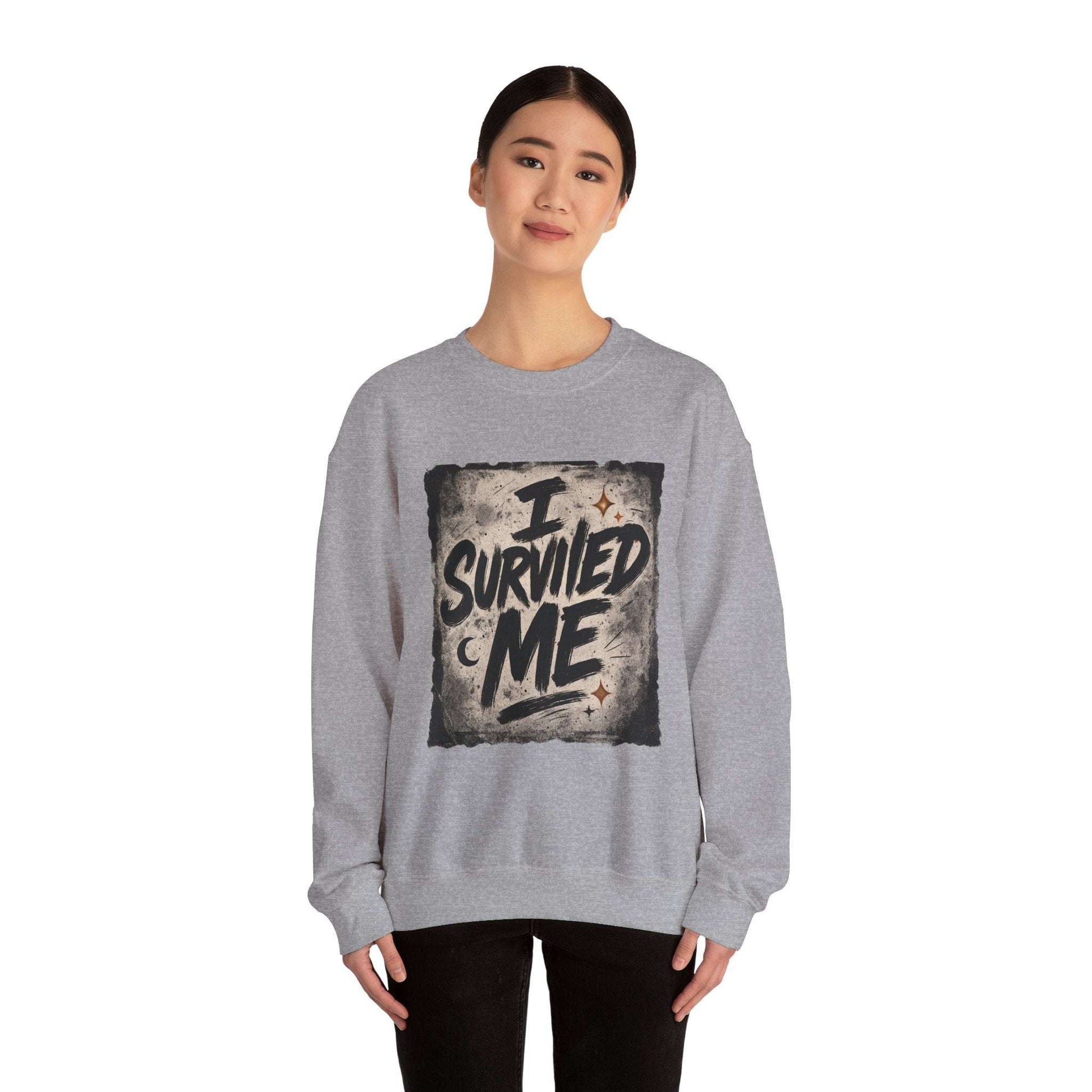 Survived Me Sweatshirt – Inspirational Grunge Crewneck in heather gray with bold 'I Survived Me' text, worn by a model. Ideal for self-love and resilience.