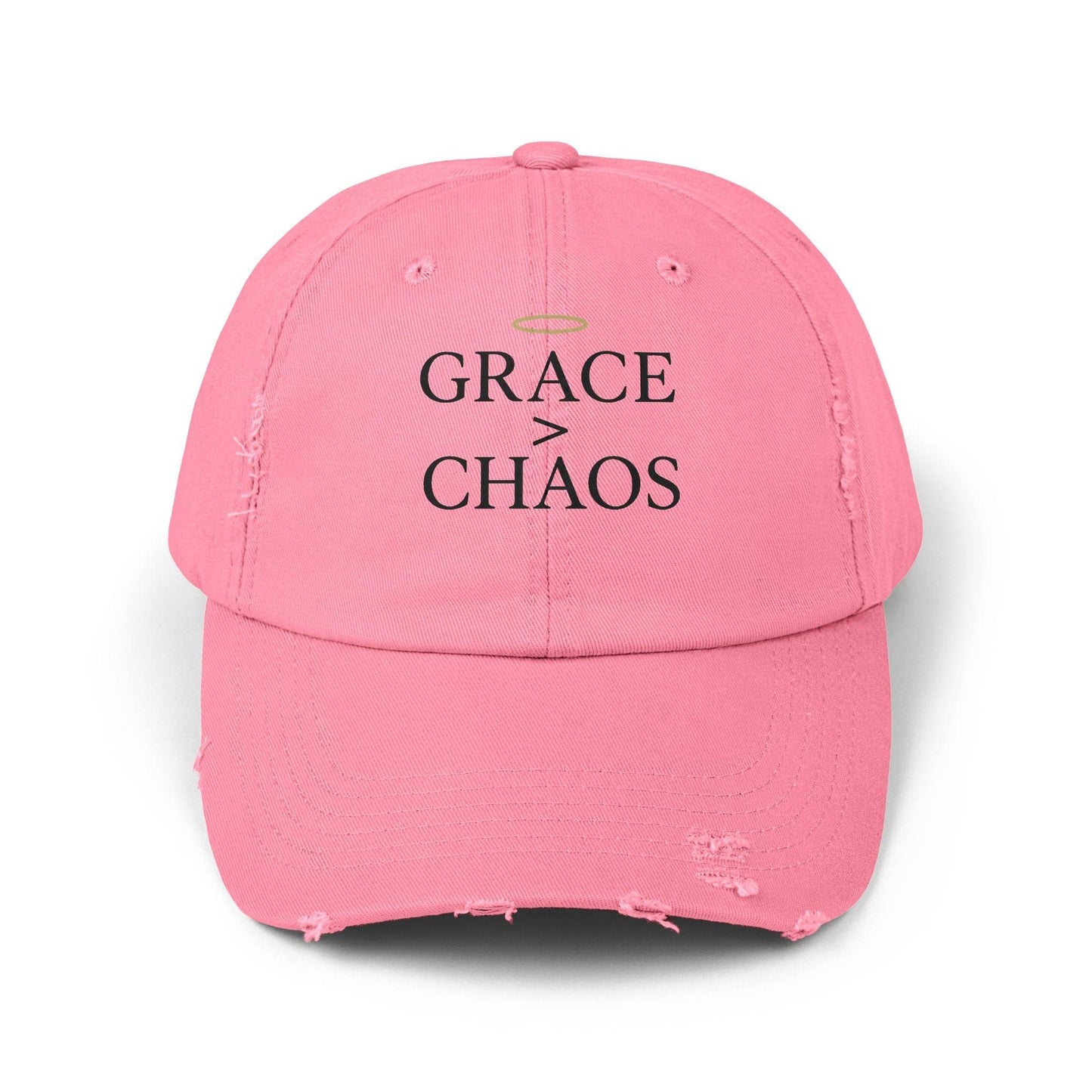 Front view of pink Grace > Chaos Embroidered Distressed Cap with black embroidery and halo icon, ideal for inspirational headwear.