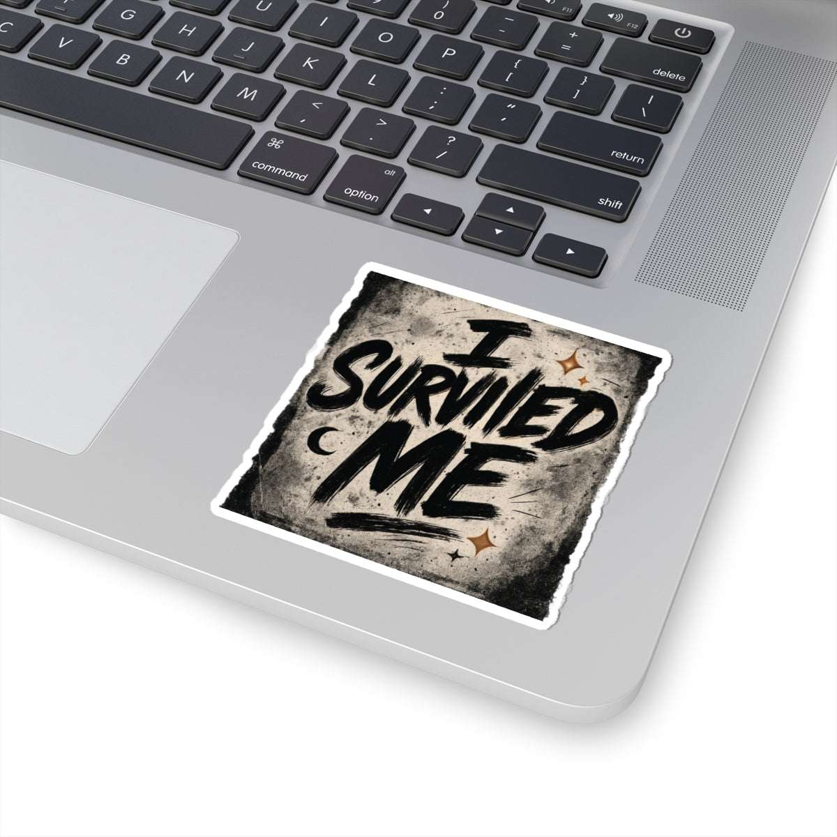 I Survived Me grunge sticker applied on a laptop, showcasing its use as a bold and empowering tech accessory.