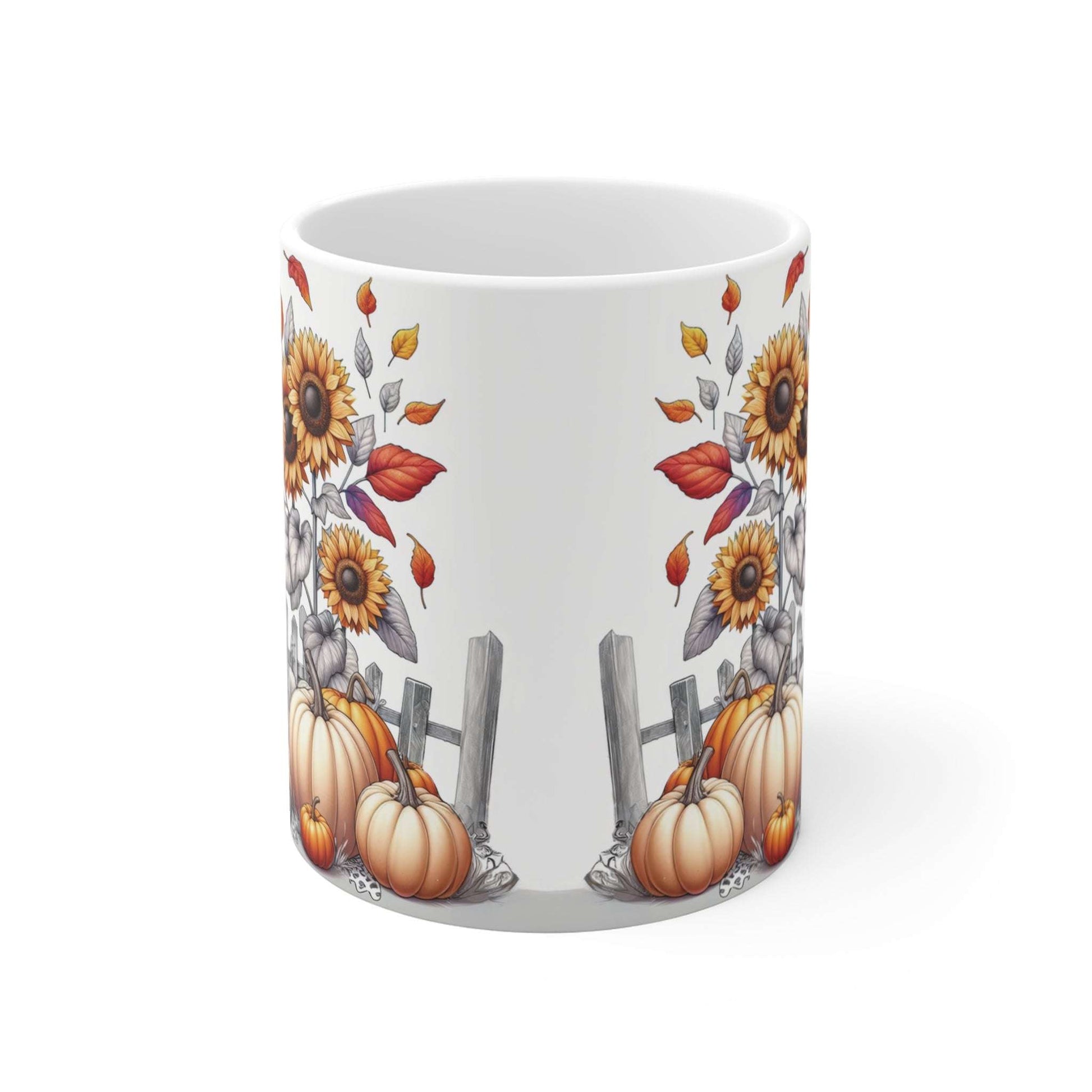 Mug with autumn-themed design featuring pumpkins, sunflowers, and leaves on a white background
