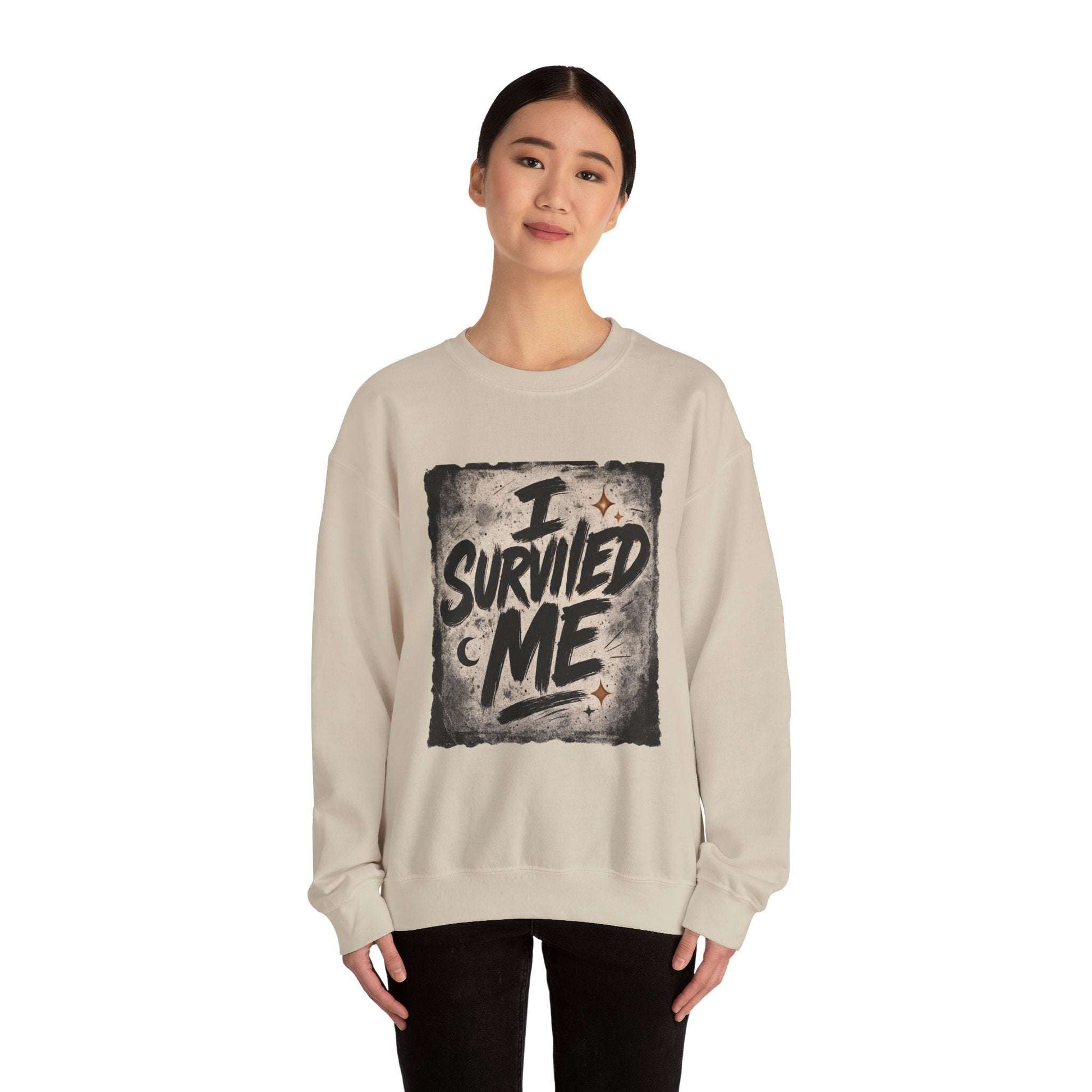 Beige Survived Me Sweatshirt modeled for a relaxed, inspirational look in supportive streetwear fashion.