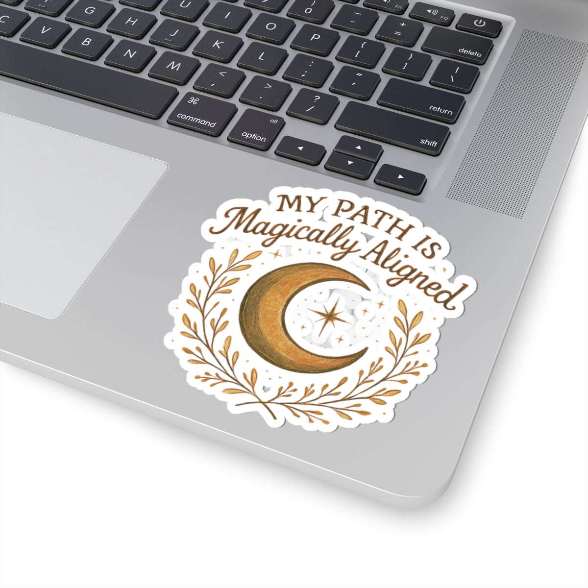 Bohemian crescent moon sticker with 'My Path Is Magically Aligned' quote on laptop, perfect for spiritual affirmation and celestial-themed accessories.