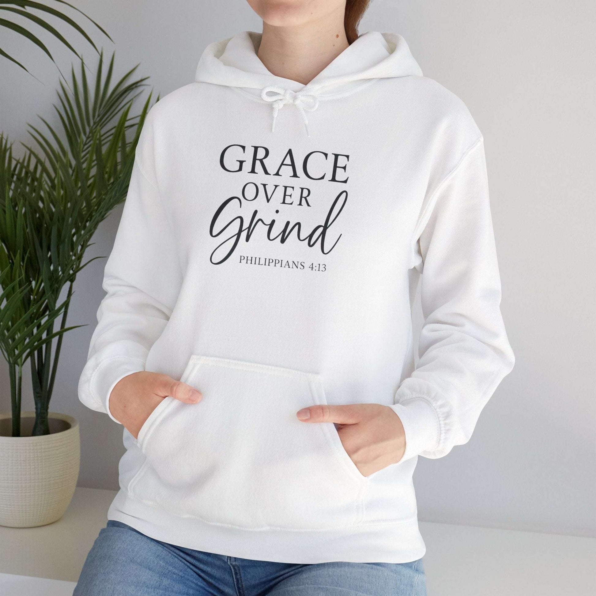 Grace Over Grind Christian hoodie in white worn by model