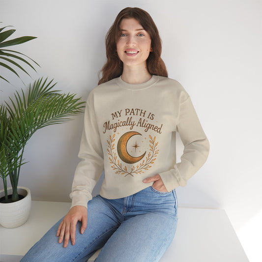 Beige My Path Is Magically Aligned Crescent Moon Sweatshirt worn by woman, featuring celestial design and spiritual affirmation text.