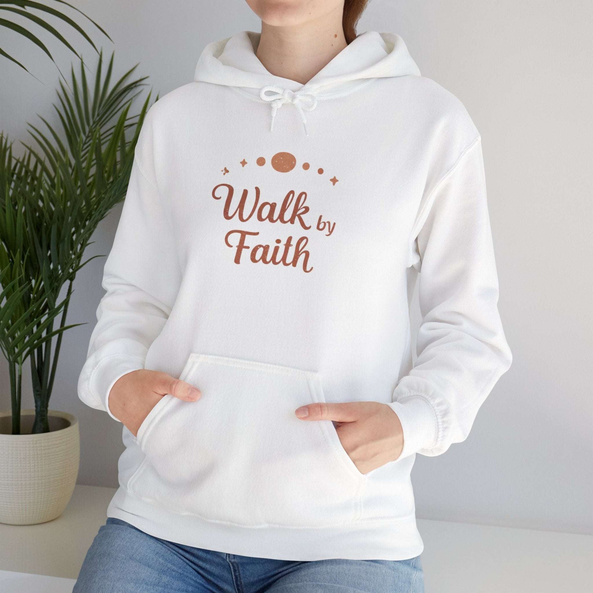 White Faithful Walk Hoodie worn by woman, featuring 'Walk by Faith' message for Christian lifestyle and comfort wear.