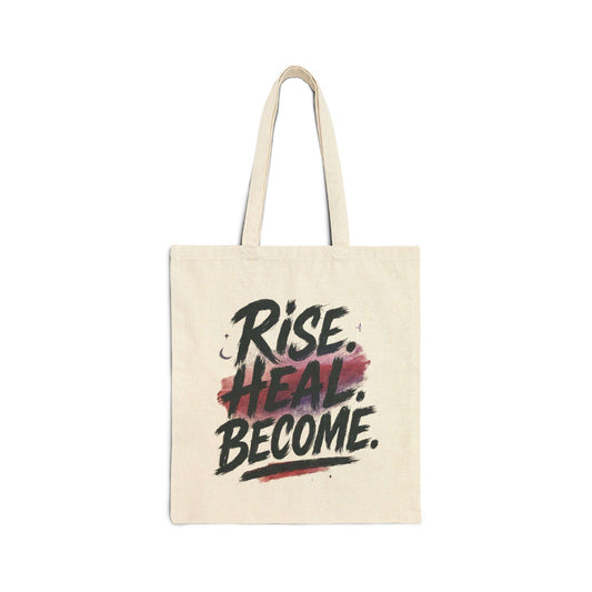 Rise Heal Become Tote Bag – Inspirational Canvas Shopper with bold black and red quote text on natural cotton fabric, ideal for daily use.