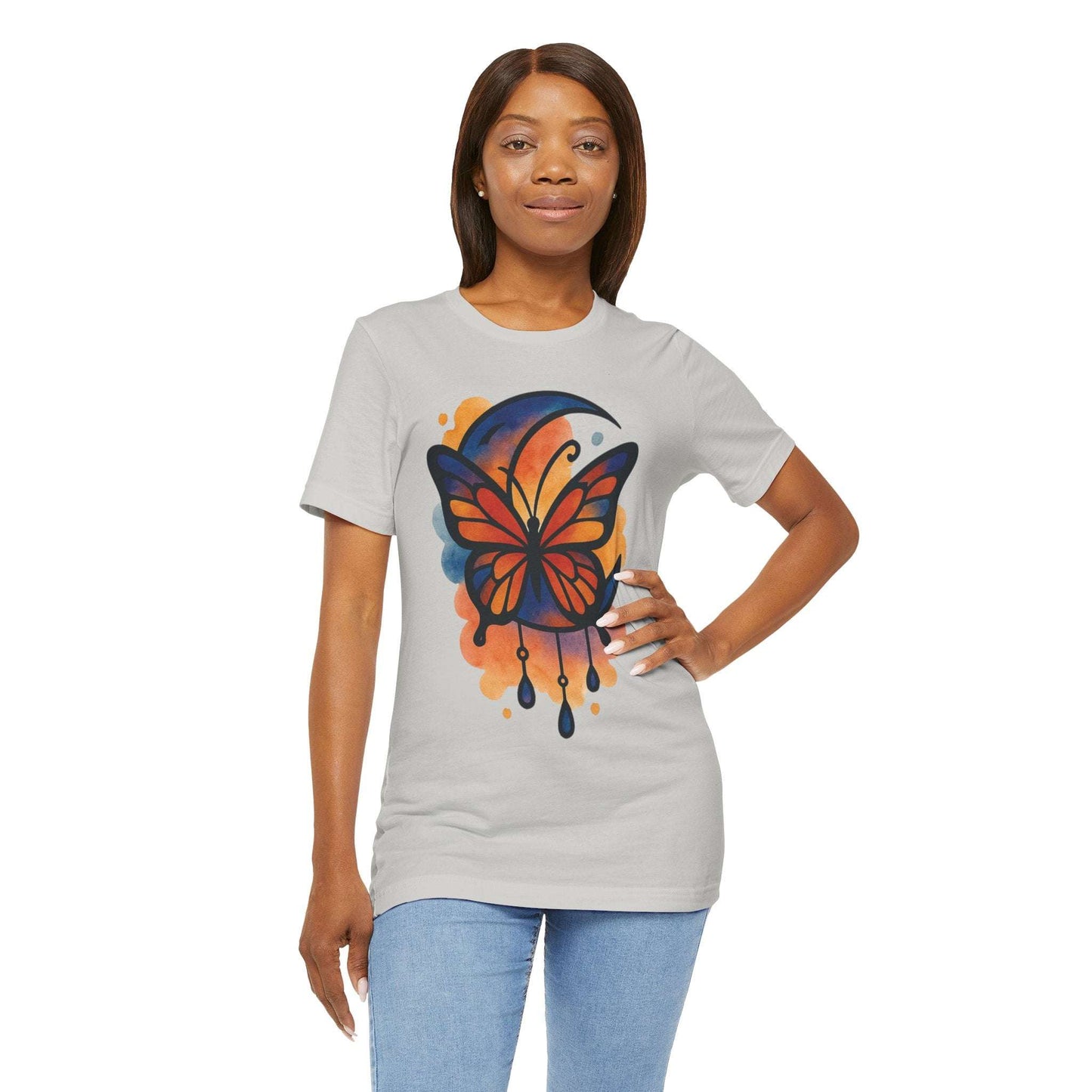 Woman wearing a gray t-shirt with a colorful butterfly design on a white background