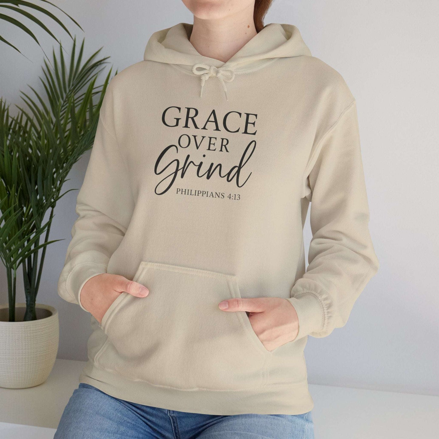 Grace Over Grind Christian hoodie in white lifestyle photo