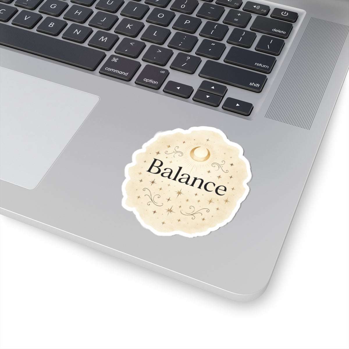 Balance themed round sticker placed on a neutral background, featuring elegant gold floral accents and inspirational typography.”