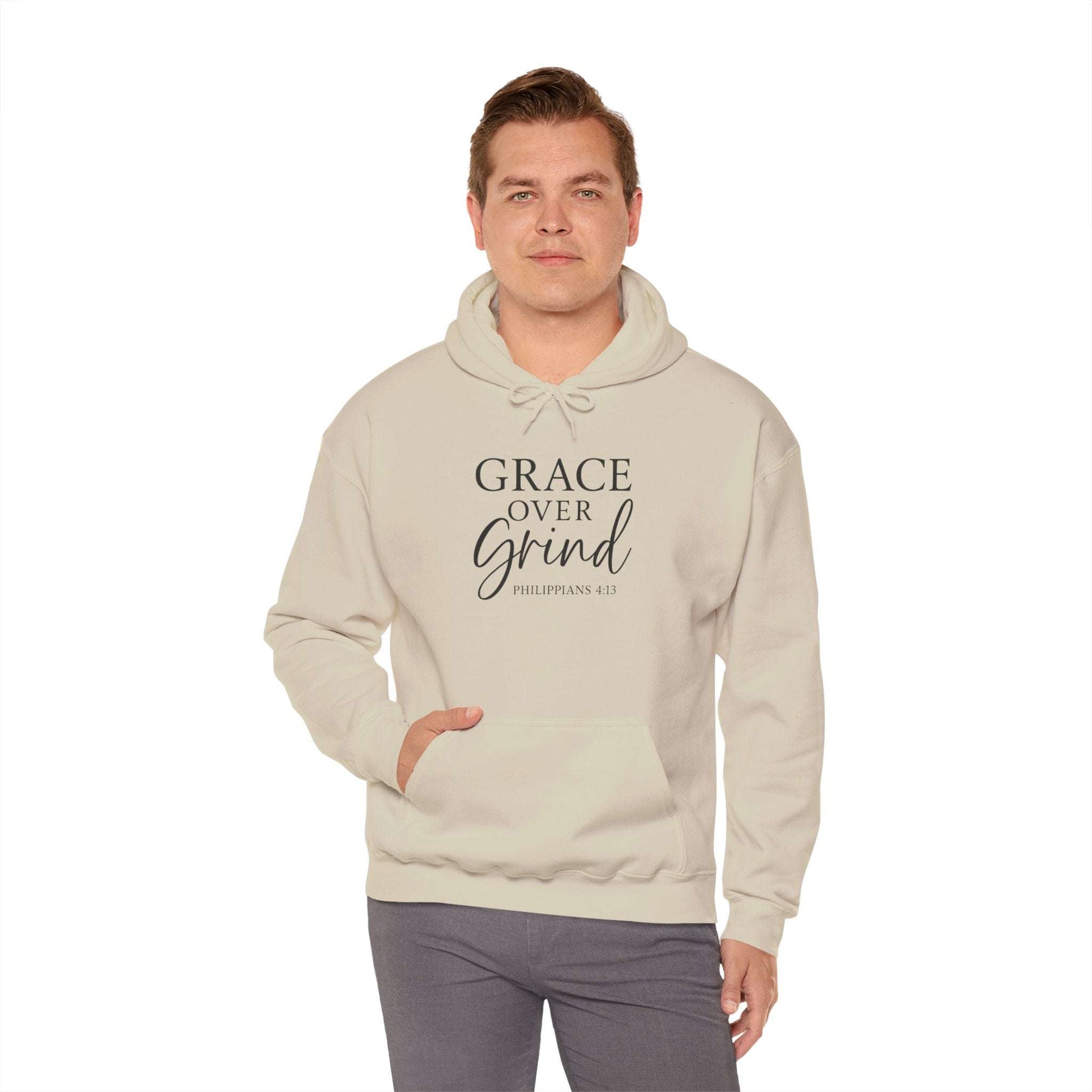 Grace Over Grind Christian hoodie in beige worn by model