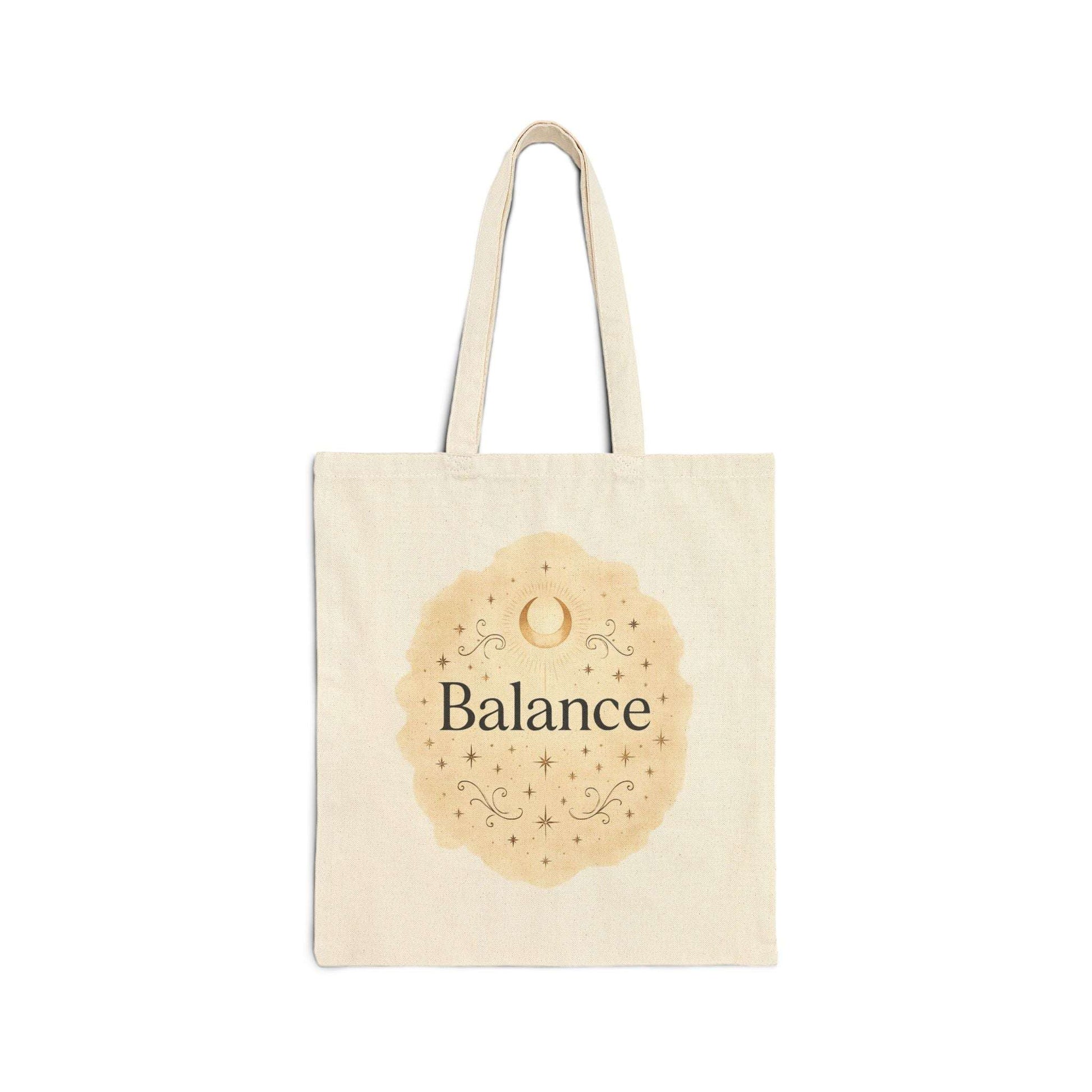 Beige tote bag with 'Balance' text and decorative design on a white background