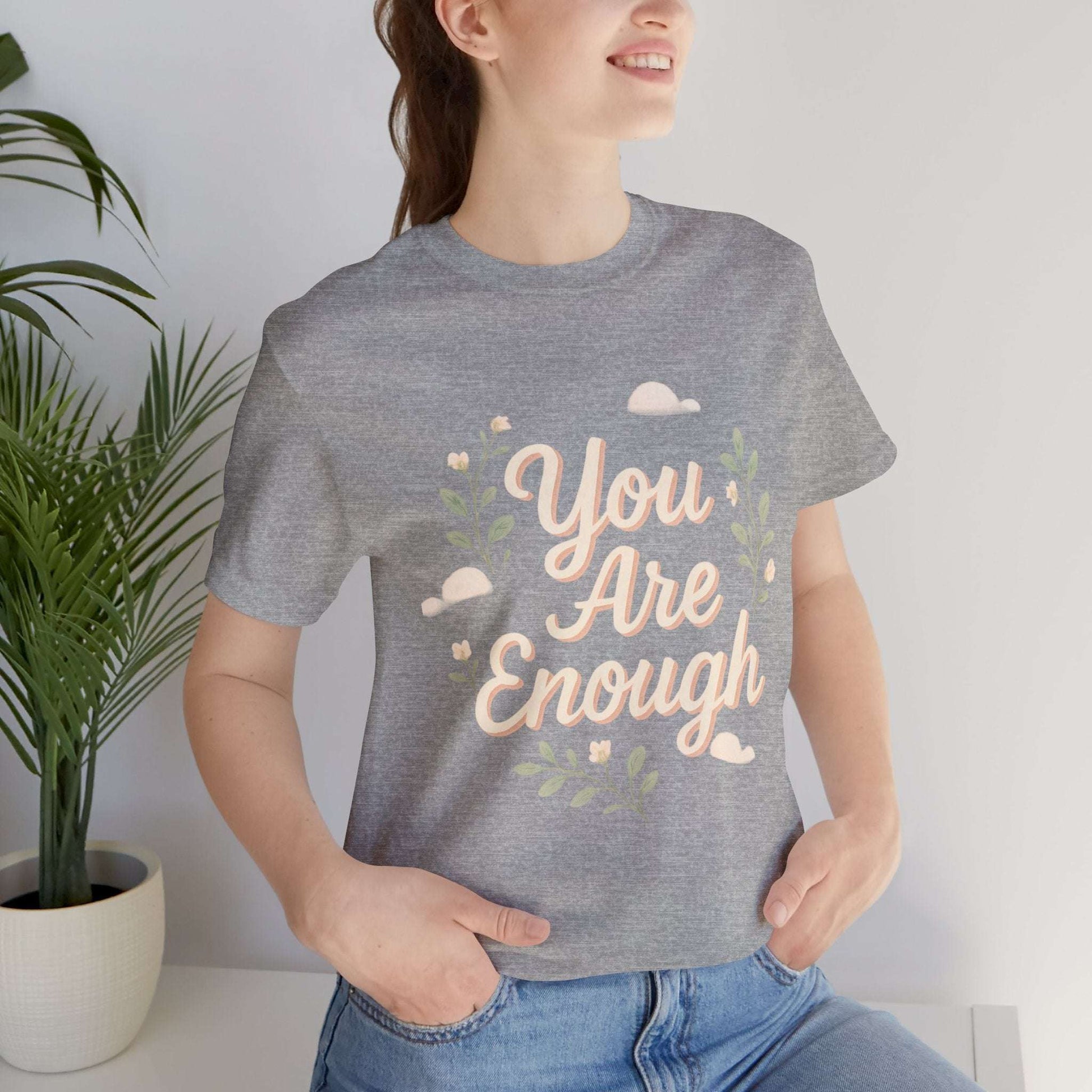 Heather gray Floral Tee You Are Enough Unisex Jersey modeled casually, highlighting comfort fit and motivational design.