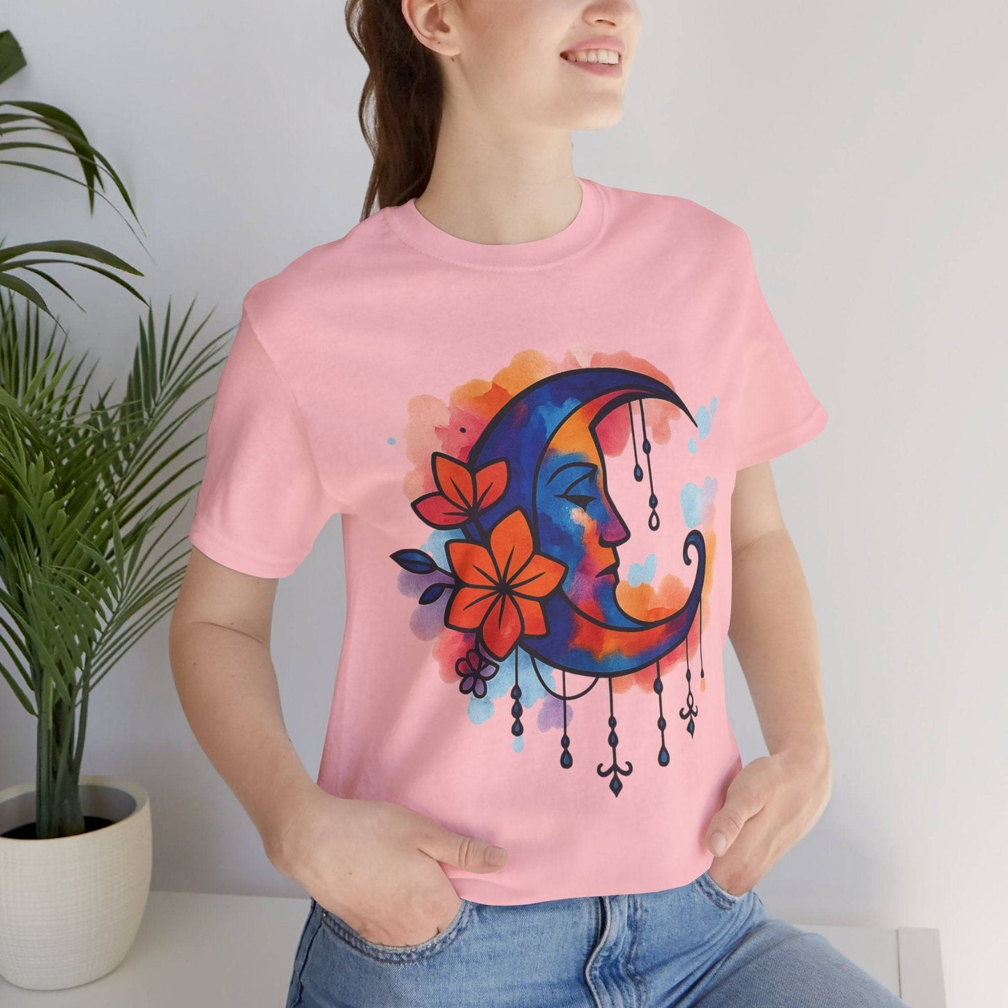 Pink Colorful Boho Crescent Moon T-Shirt with dreamy moon goddess and floral print, ideal for cozy, feminine, and festival-ready looks.