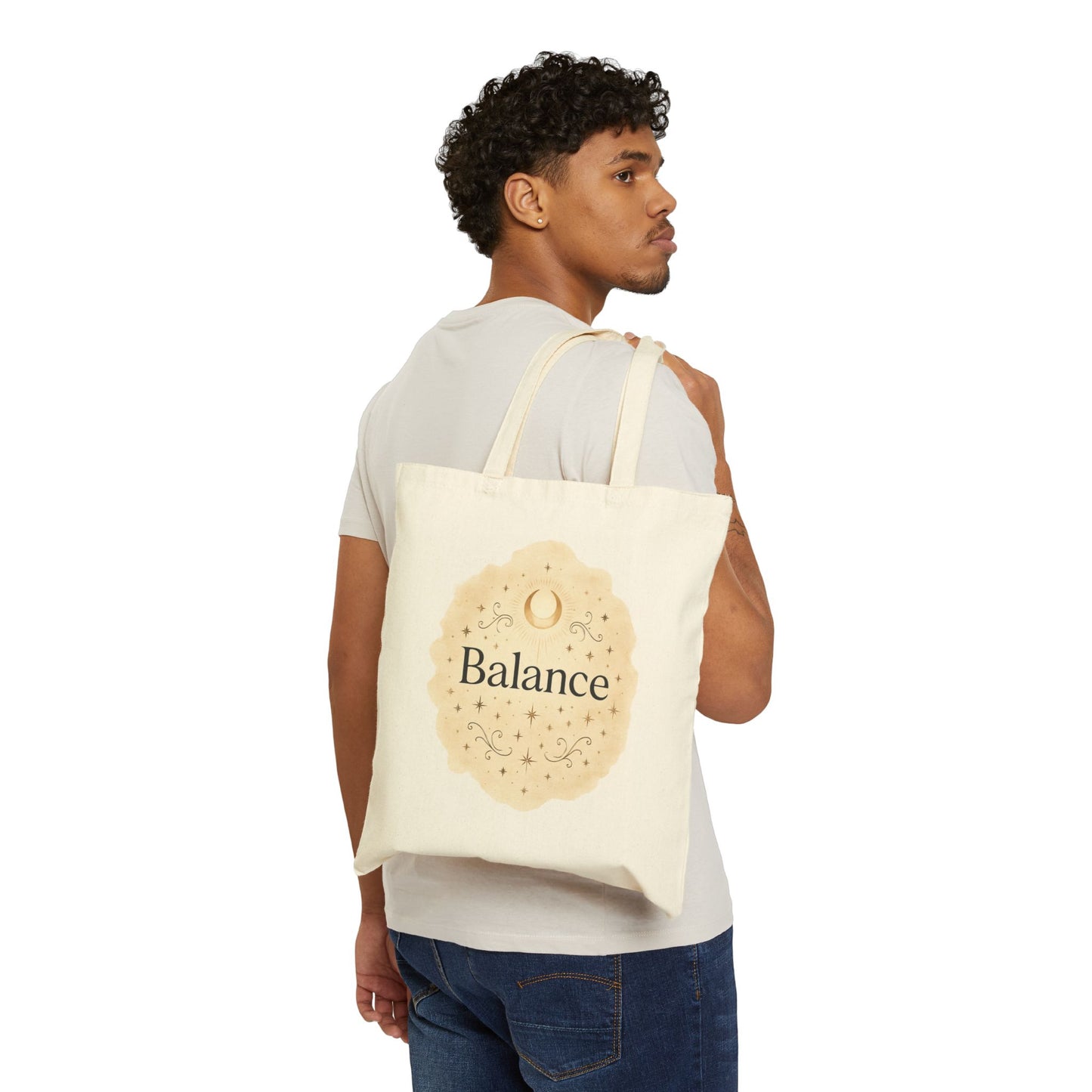 A man carrying a beige tote bag "Balance" design on a white background 