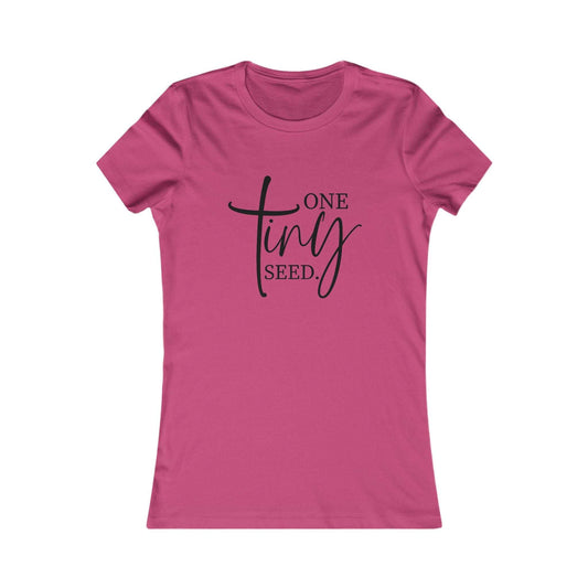 Pink One Tiny Seed women's tee with inspirational Christian graphic text in black, slim-fit cotton shirt ideal for faith-based casual wear.
