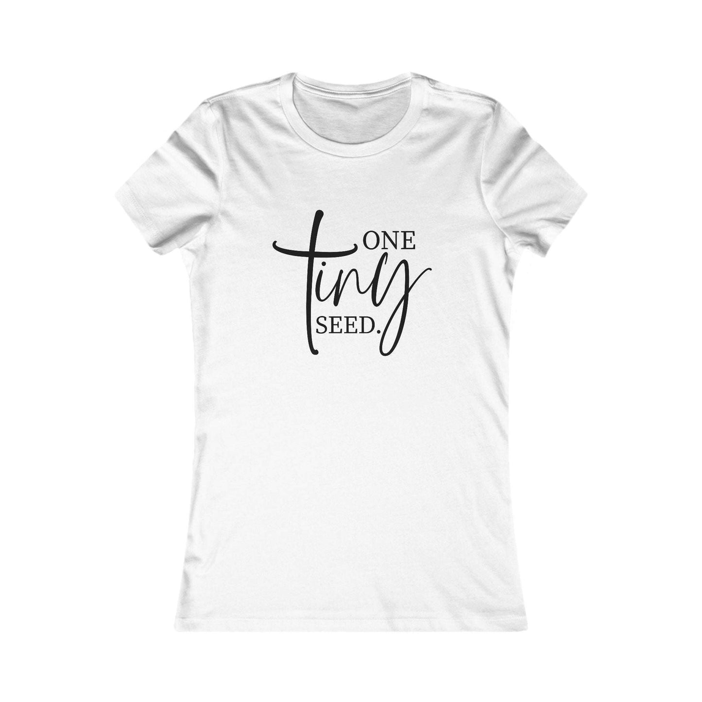 White One Tiny Seed women's tee featuring black Christian script design, breathable slim-fit cotton top perfect for layering and daily faithwear.