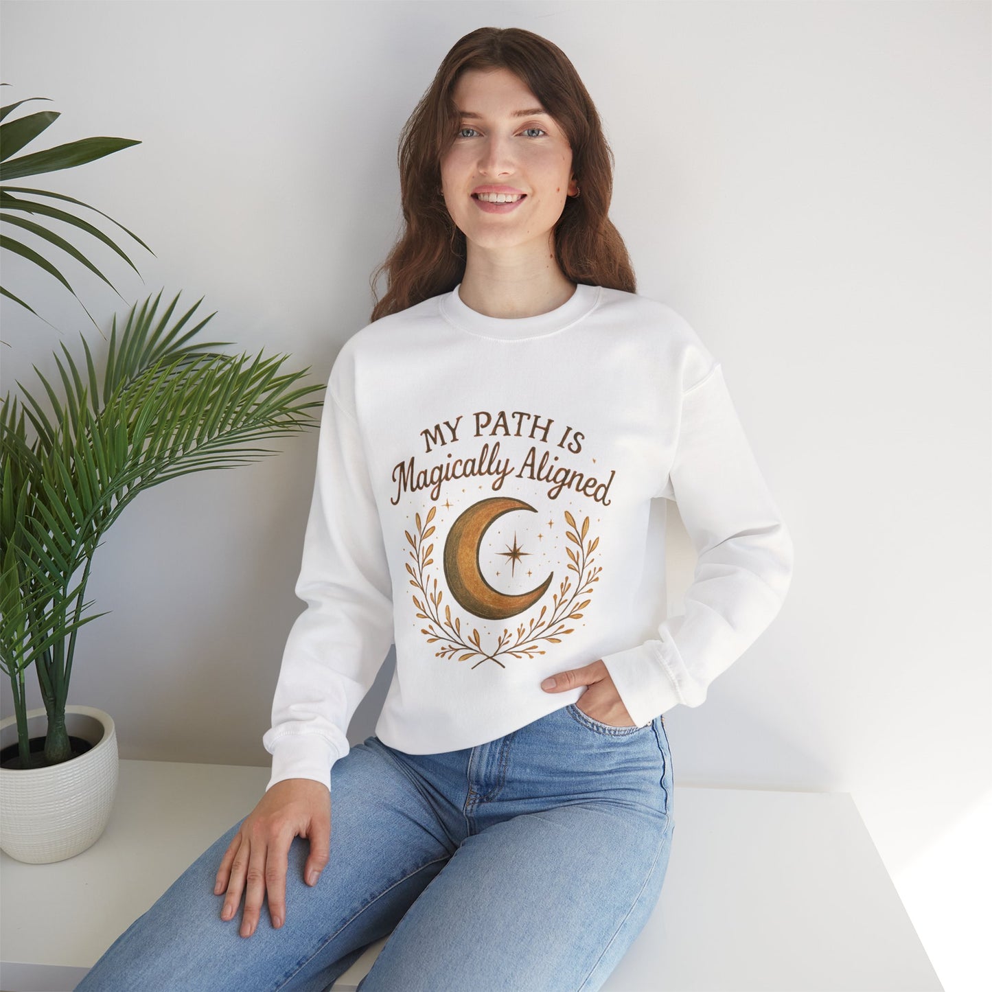 White My Path Is Magically Aligned Crescent Moon Sweatshirt styled on model, showcasing mystical moon graphic and boho aesthetic.