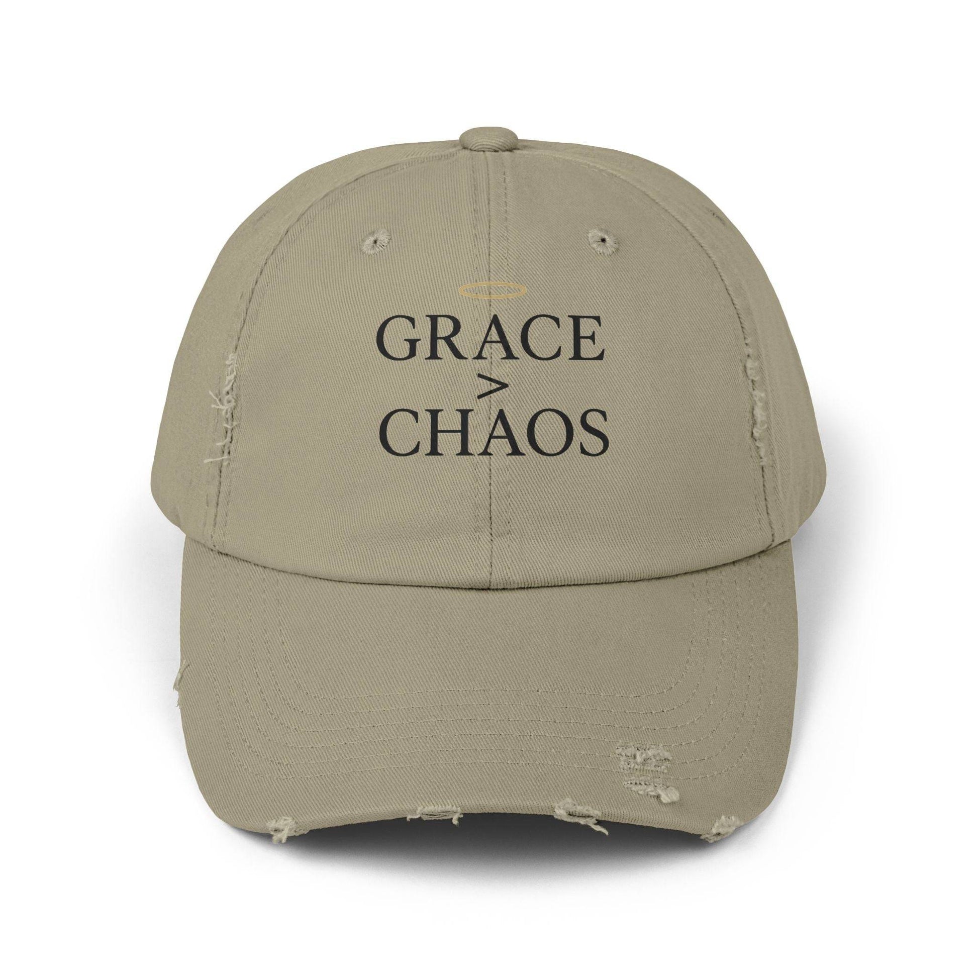 Front view of khaki Grace > Chaos Embroidered Distressed Cap with black lettering and halo icon, a motivational unisex baseball hat.